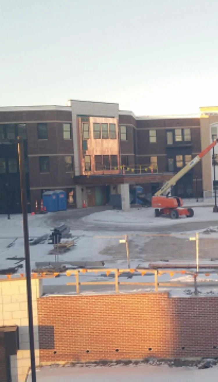 Brick commercial building under construction using SIP panels for an Arkansas project