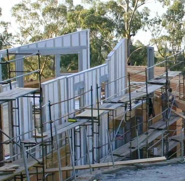 Gable-end commercial SIP panel building mid-construction