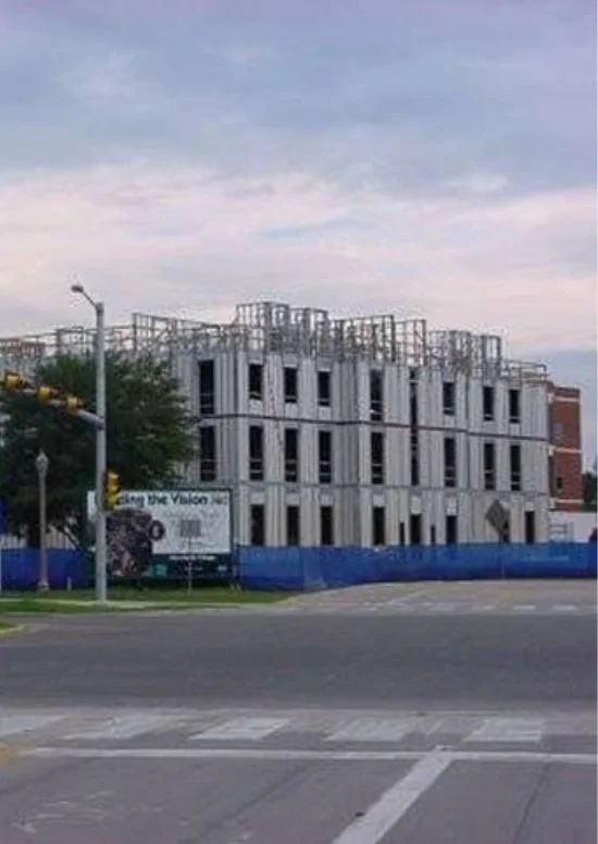Washington DC (4) Multi-story panel building framed to roofline near street intersection